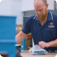 An image of a Taipan worker packing materials