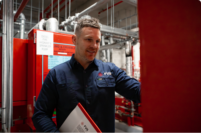 Fireman holding a fire extinguisher