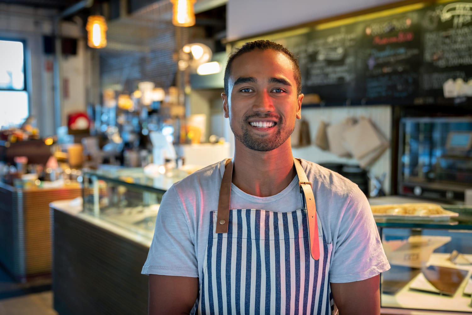 Cafe worker smiling