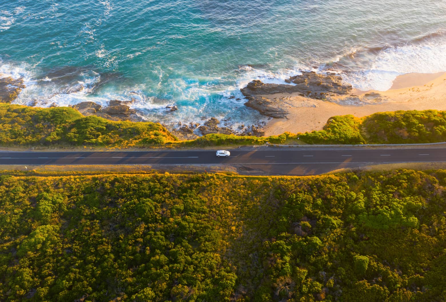 Car driving on Australian coastline