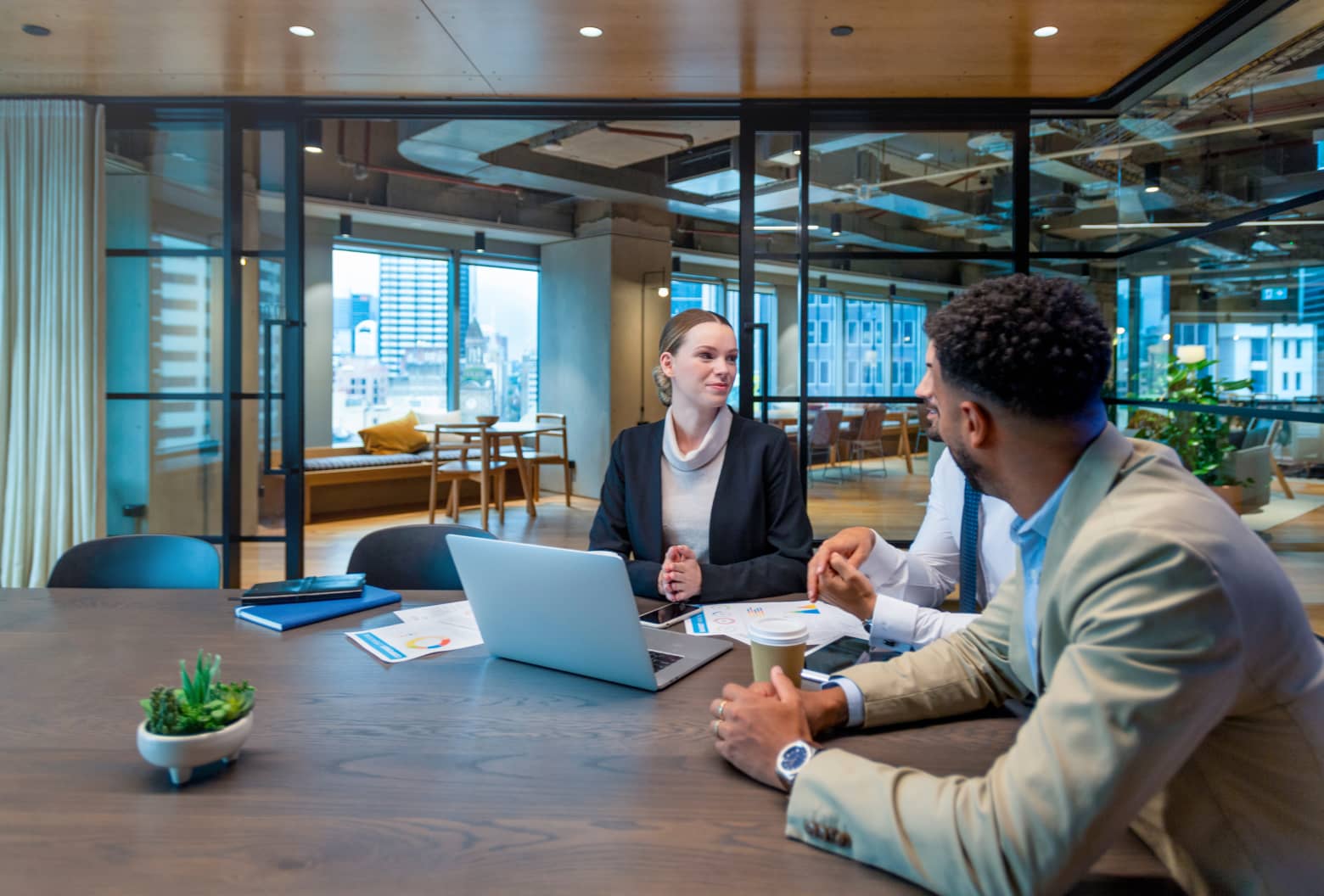 Group of workers at an office table