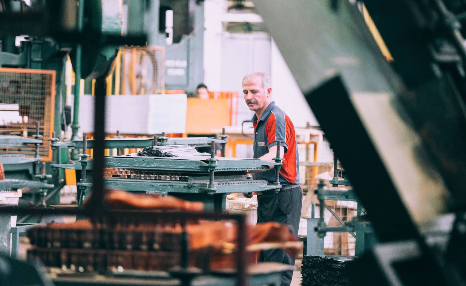 Man in a manufacturing garage