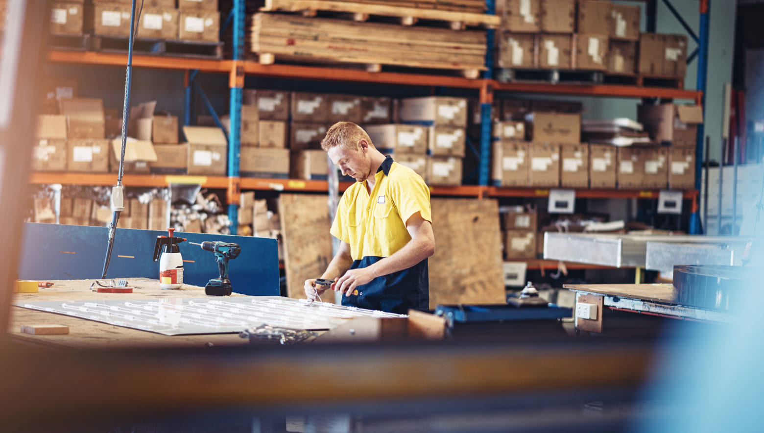 Man working with tools in warehouse