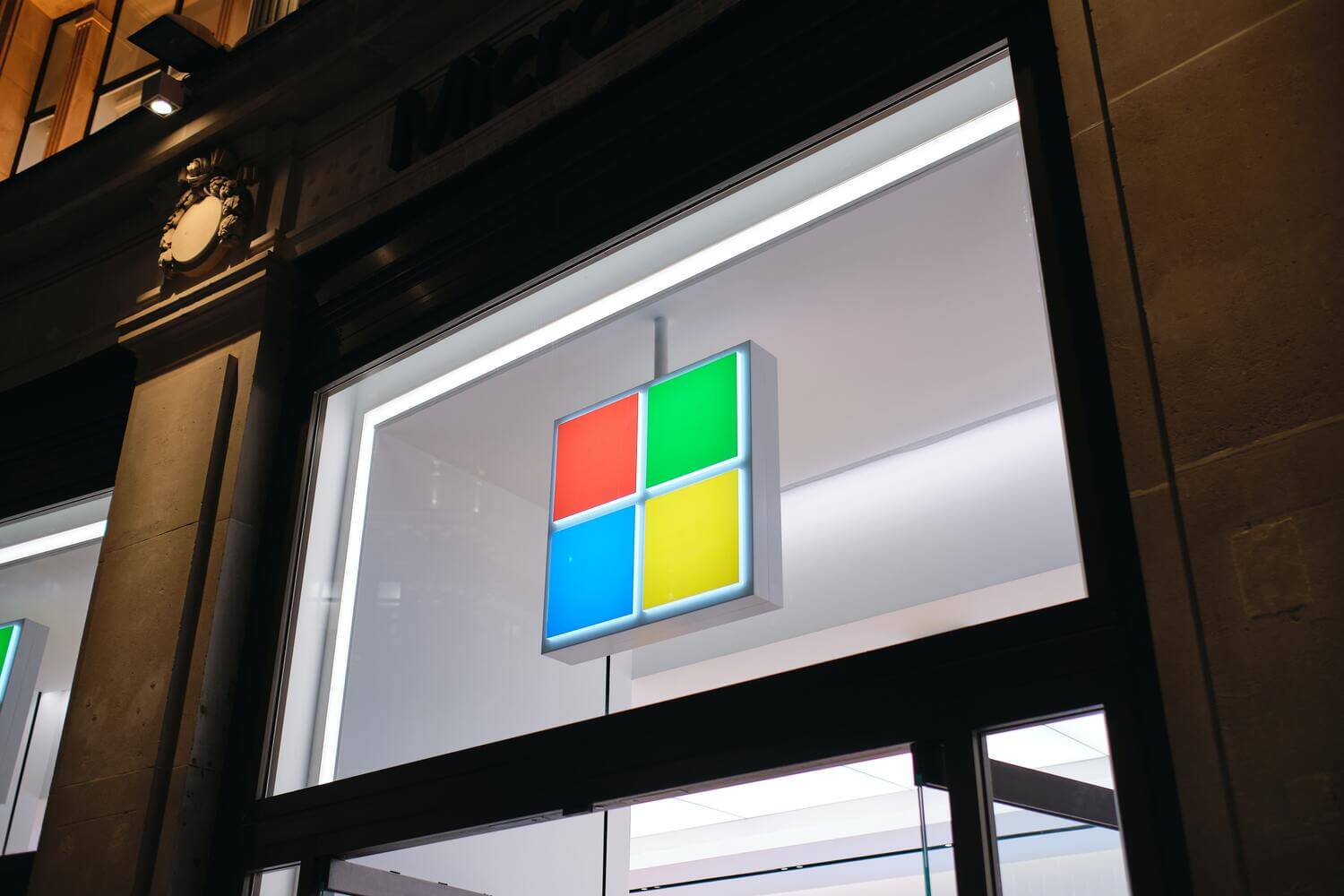 Microsoft logo at front of building above doorway