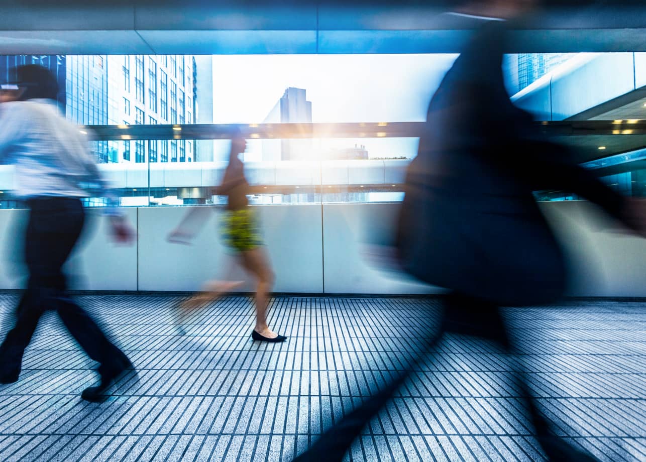 Workers walking fast